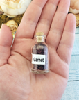 Garnet Natural Crystal Chips Bottle - One Bottle in Hand
