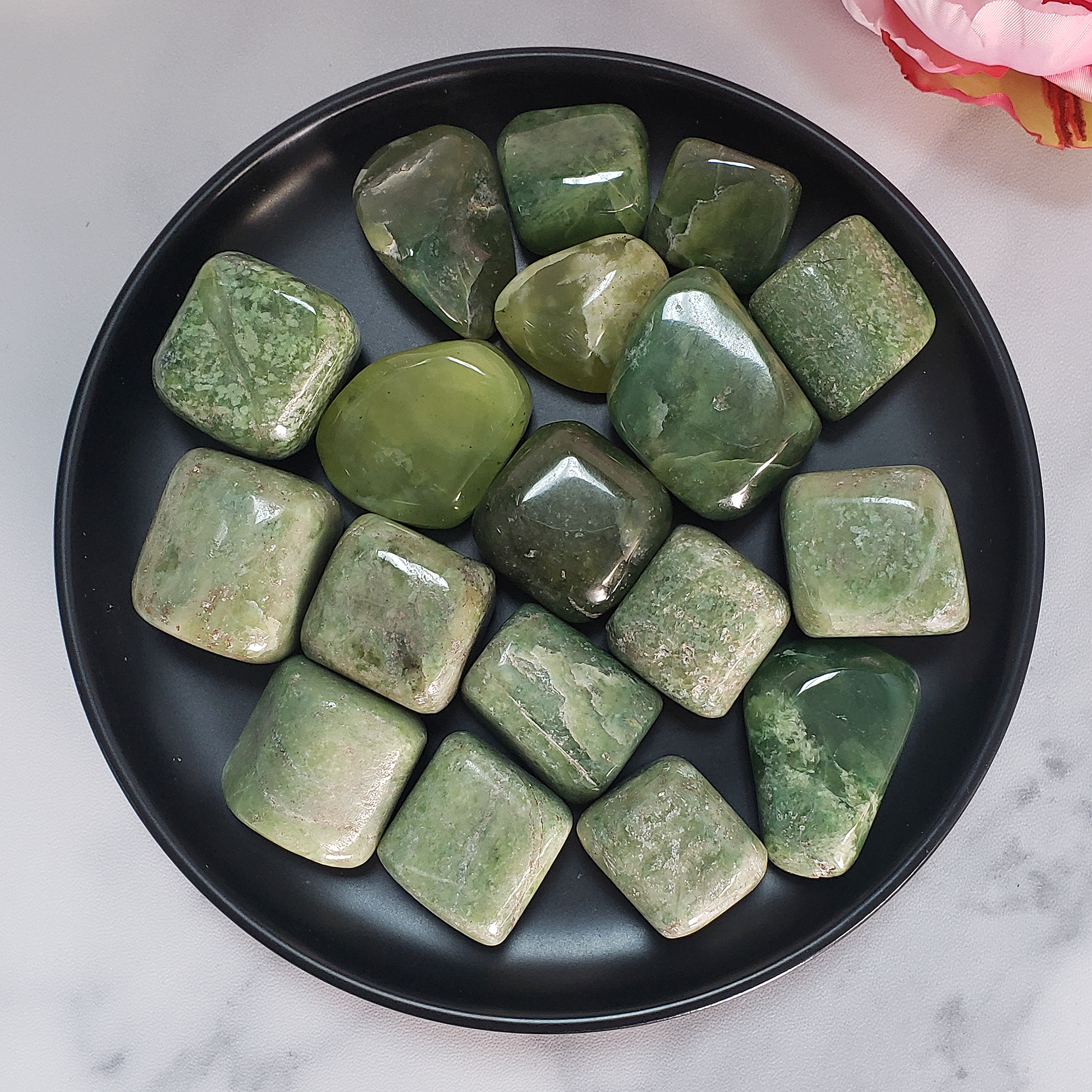 Grossularite | Green Grossular Garnet Crystal Natural Tumbled Stone | Multiple Sizes - In Black Ceramic Bowl