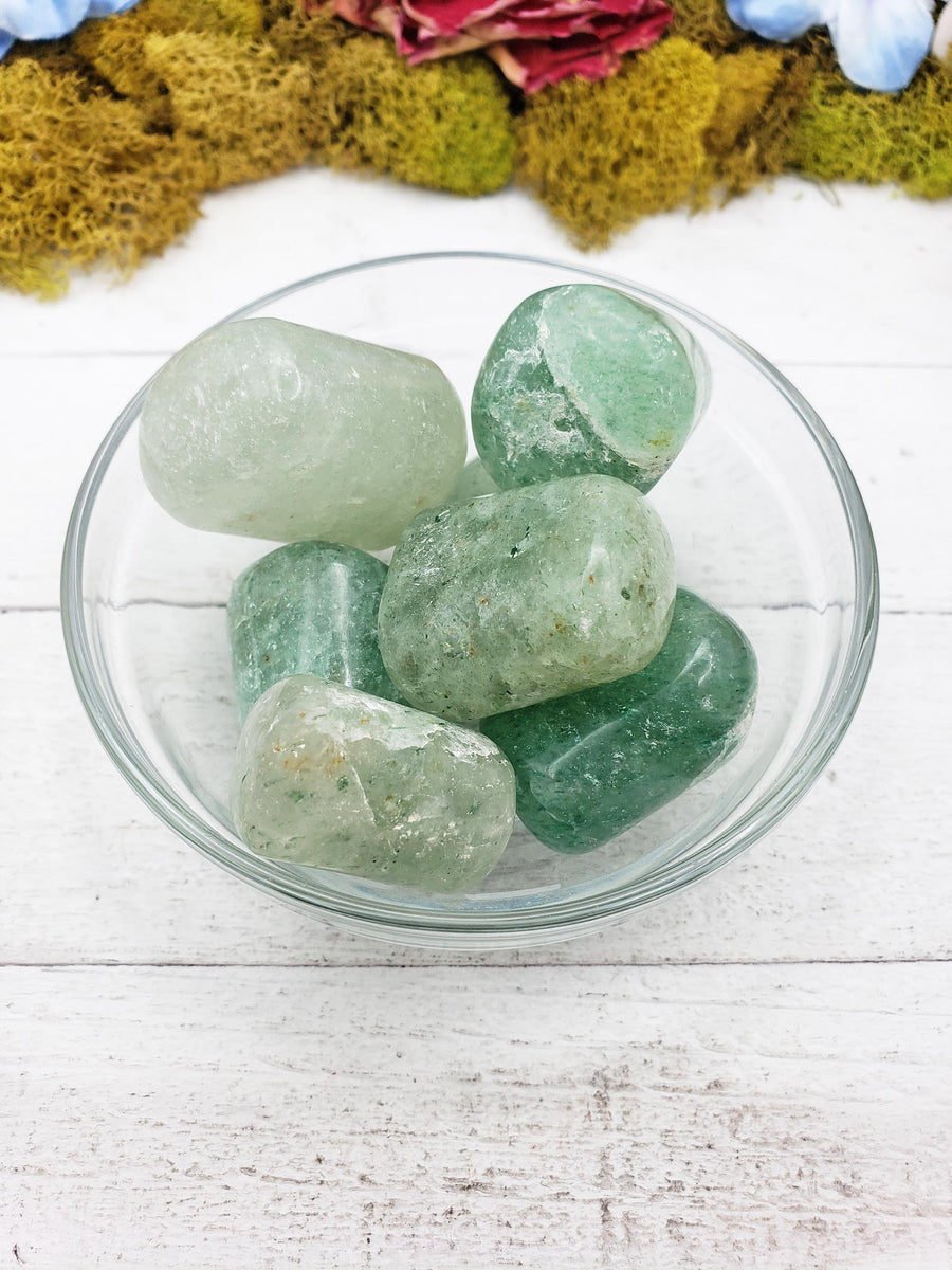 green included quartz crystals in glass bowl