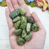 asterite stones in hand