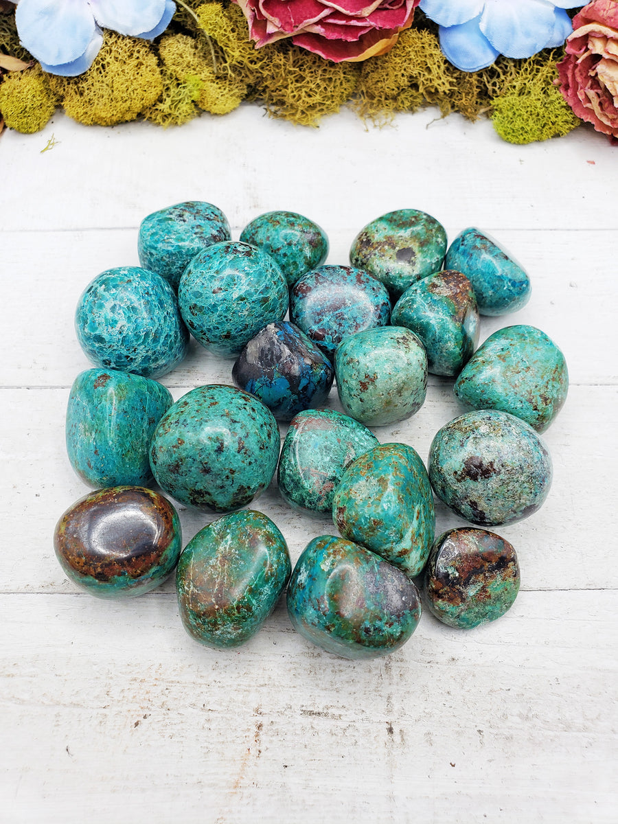 chrysocolla stones on display