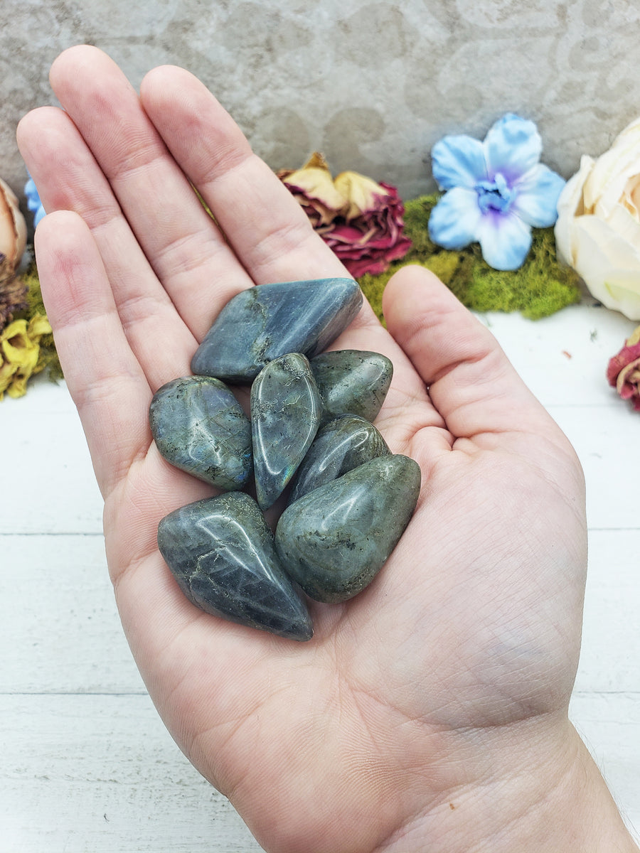 labradorite stones in hand