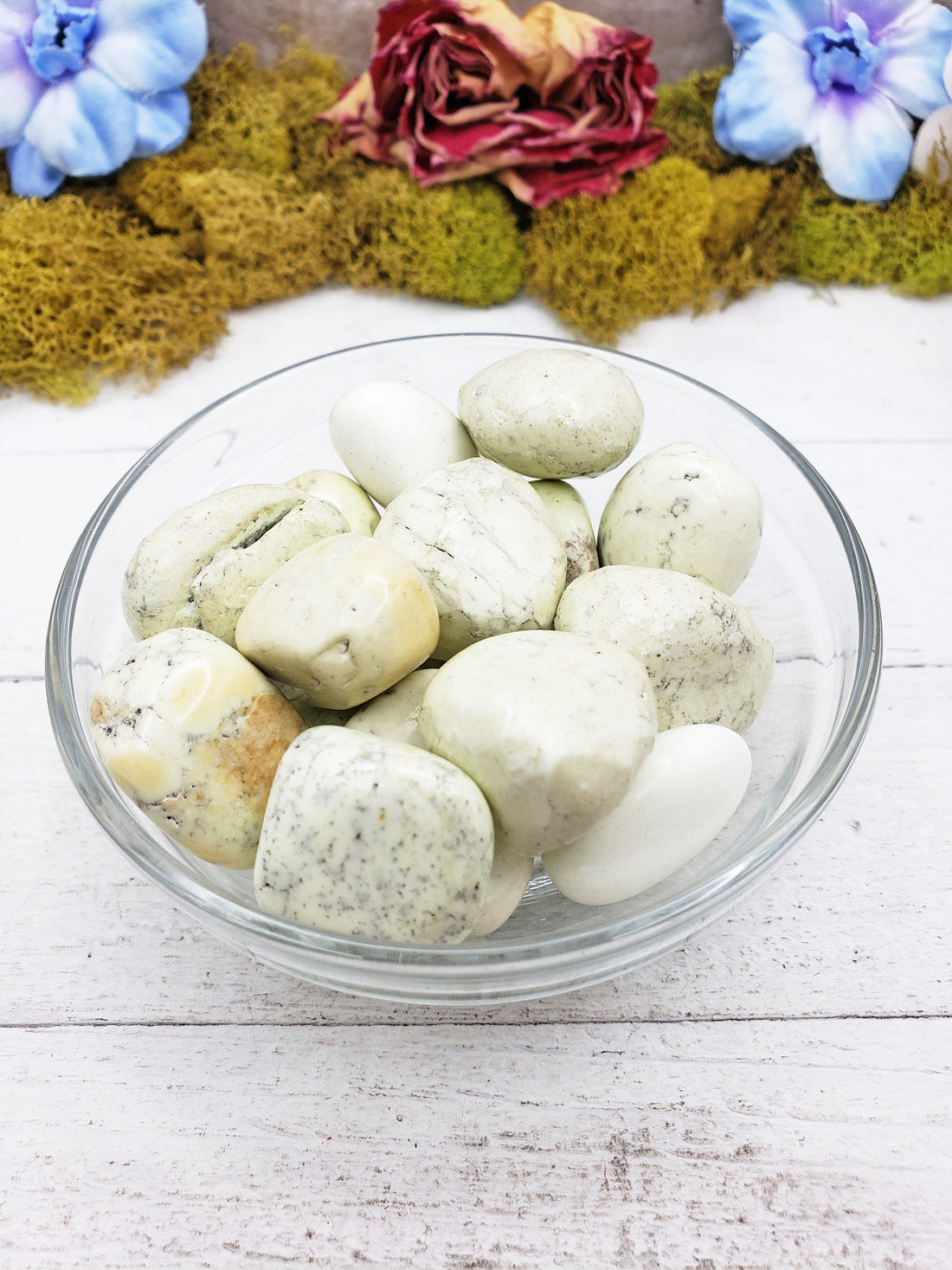 lemon chrysoprase stones in glass bowl