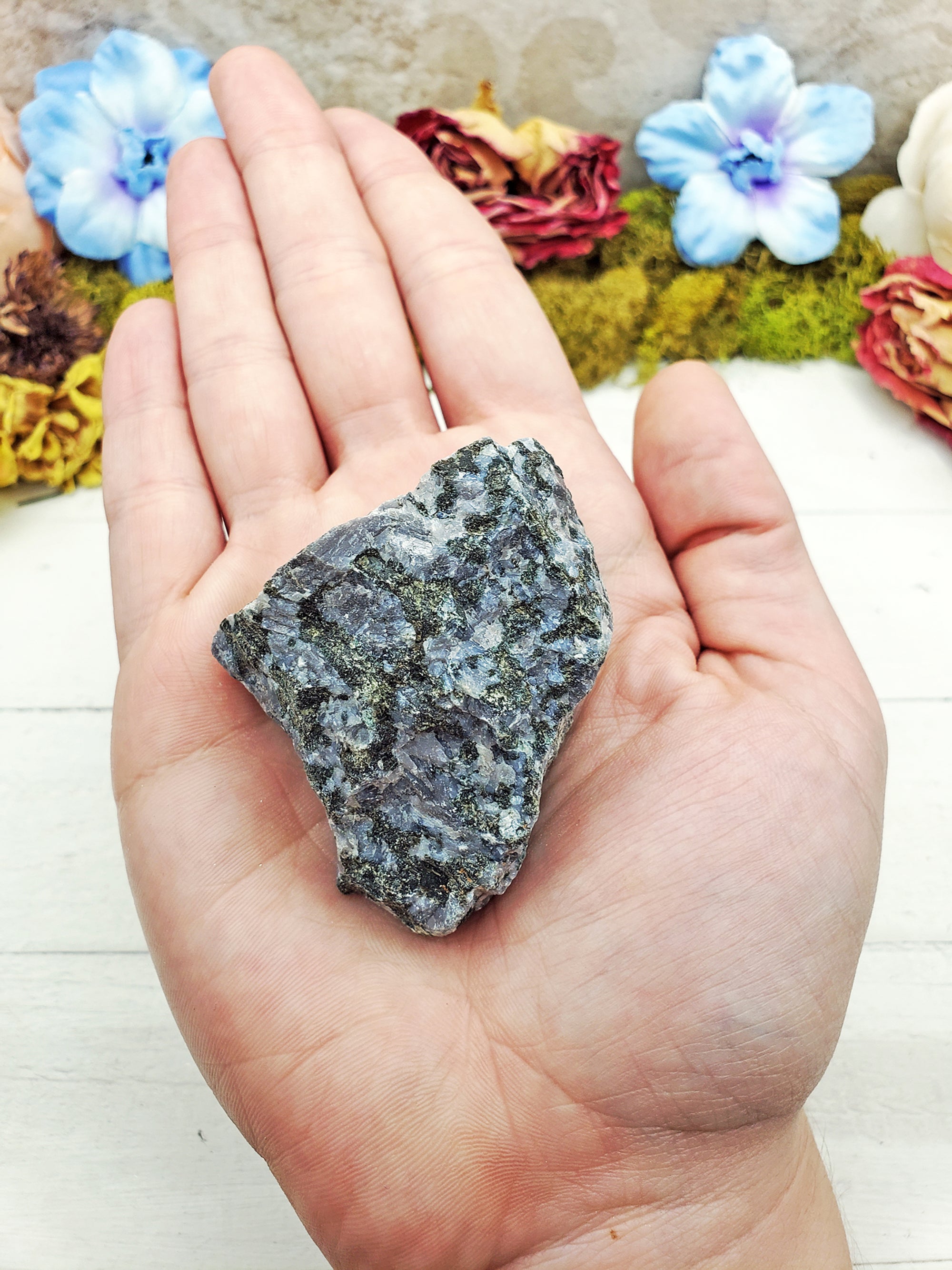 Merlinite Stones in hand