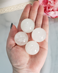 Milky Quartz Natural Gemstone Sphere Crystal Orb Marble - One 30mm Sphere - Four Milky Quartz Crystal Spheres in Hand