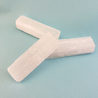 MINI Rough Selenite Crystal Stick - One 2.5 Inch Stick - On Blue Background