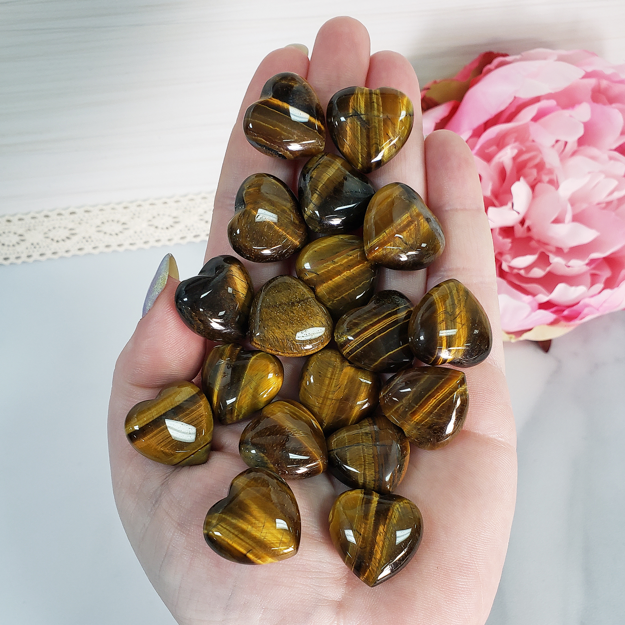 Tigers Eye Stone Natural Crystal Heart Mini Carving - Handful in Indoor Light