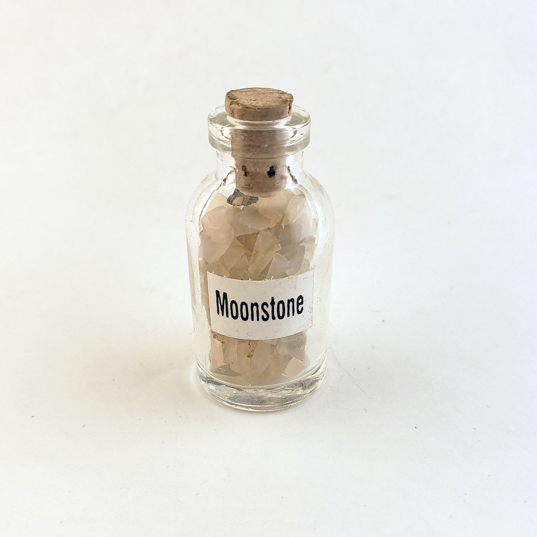 Moonstone Natural Crystal Chips Bottle - One Bottle on White Background