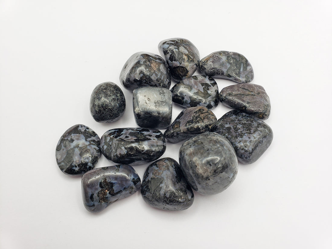 merlinite indigo gabbro stones on white background