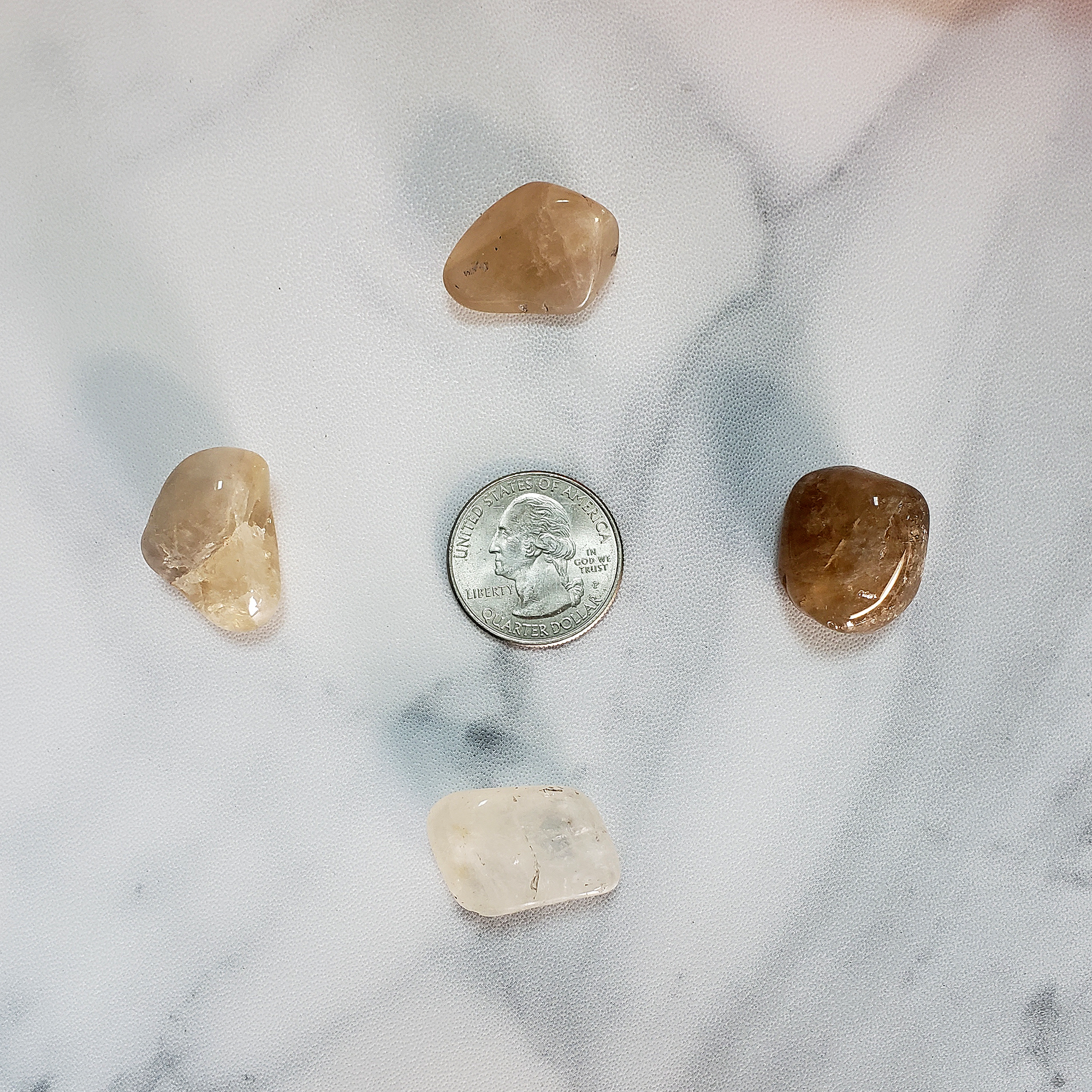 Pale Smoky Quartz &amp; Natural Citrine Crystal Tumbled Stone - Size Comparison