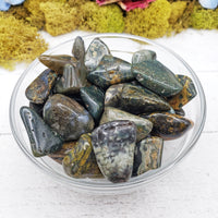 ocean jasper stones in glass bowl