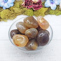 natural agate crystals in glass bowl