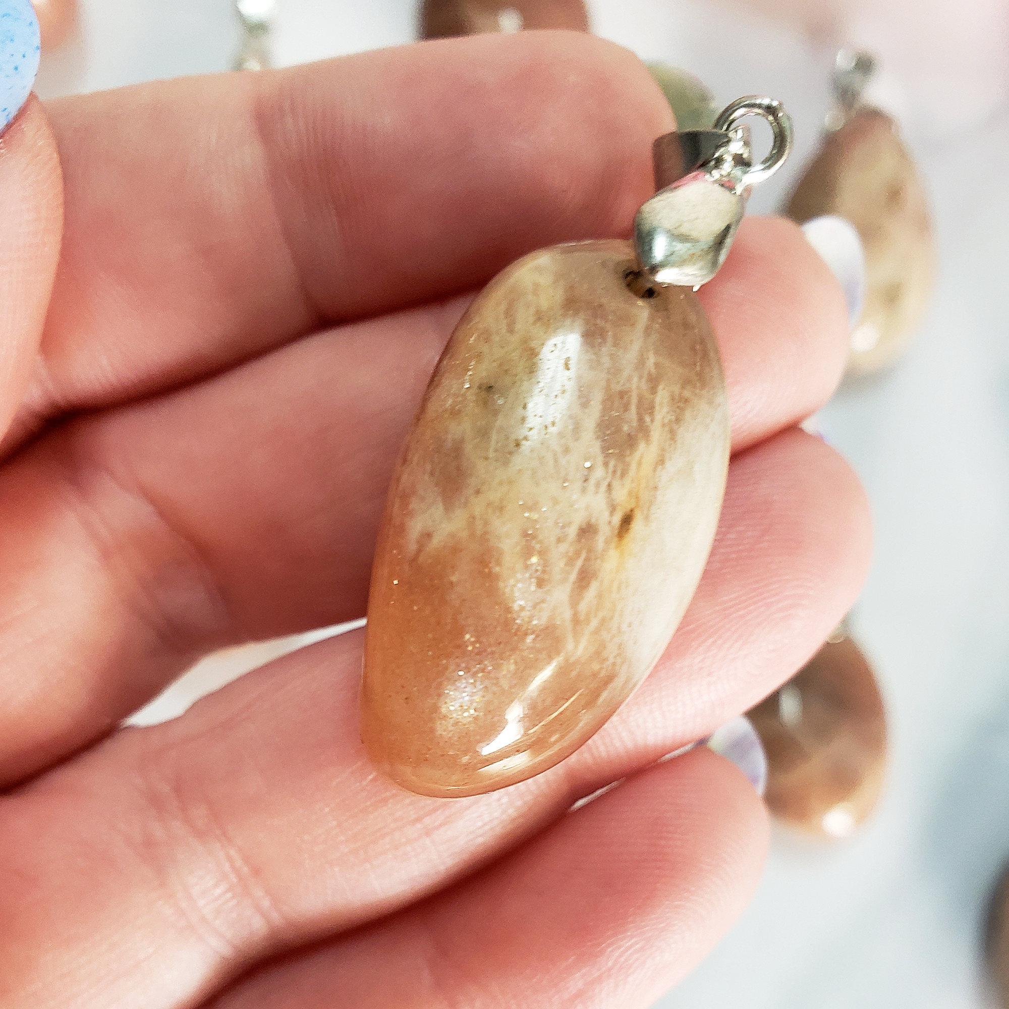 Peach Moonstone Crystal Pendant Natural Gemstone Jewelry - Close Up of Minor Flash and Inclusions