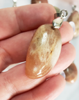 Peach Moonstone Crystal Pendant Natural Gemstone Jewelry - Close Up of Minor Flash and Inclusions