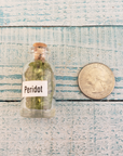 Peridot Natural Crystal Chips Bottle - One Bottle - Size Comparison