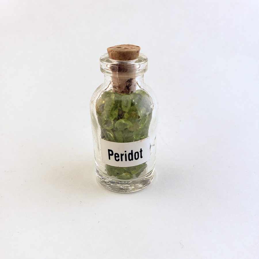 Peridot Natural Crystal Chips Bottle - One Bottle on White Background