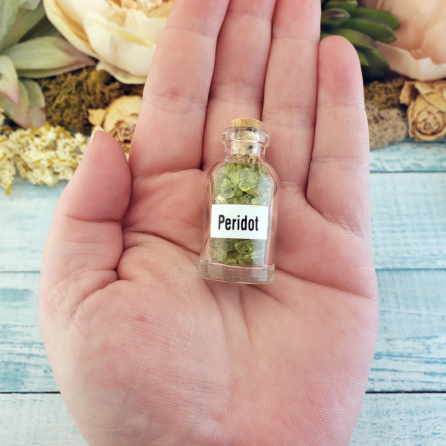 Peridot Natural Crystal Chips Bottle - One Bottle in Hand