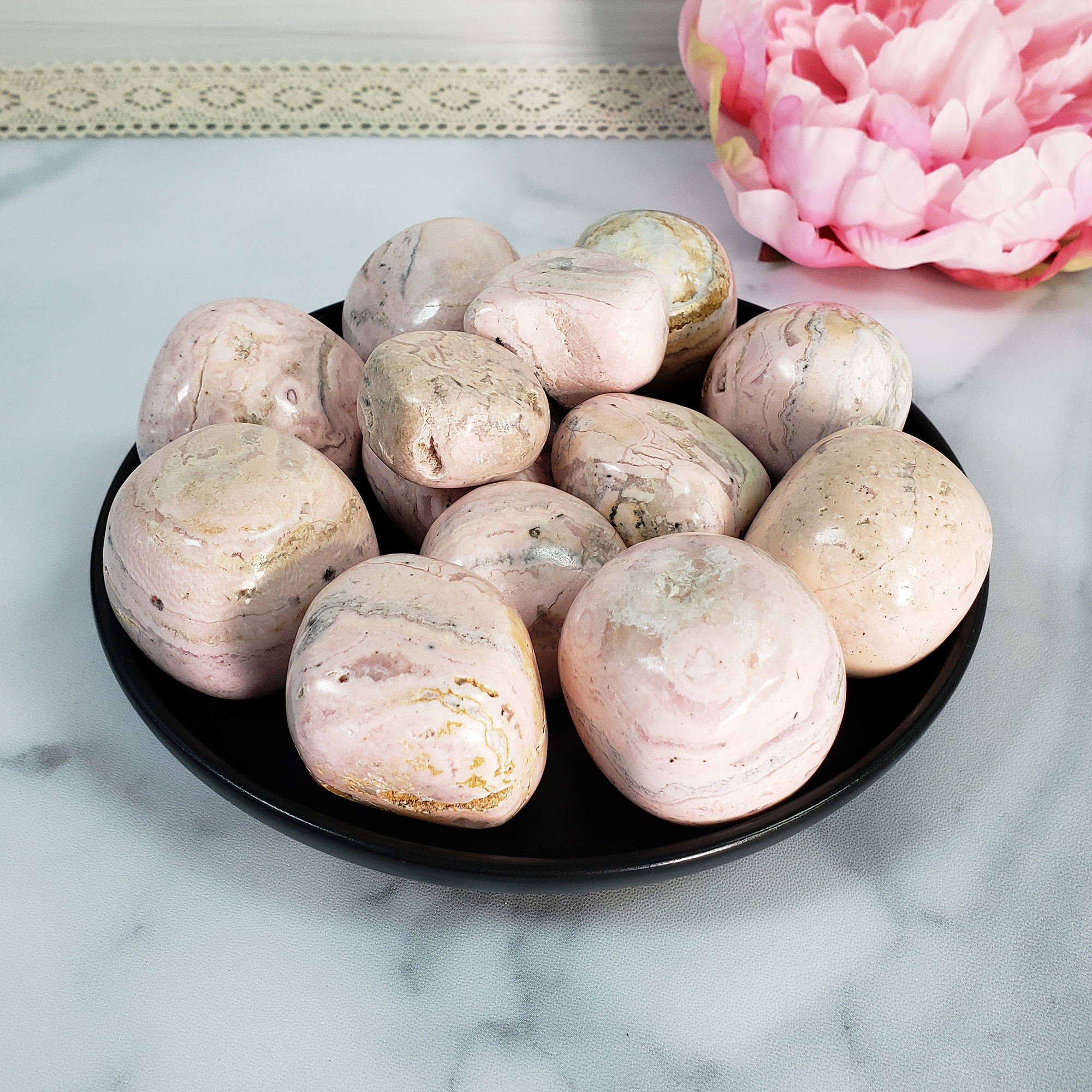 Pink Rhodochrosite Crystal Natural Gemstone Tumbled Stone | Multiple Sizes - in Black Ceramic Bowl