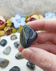 picasso jasper stones between fingers