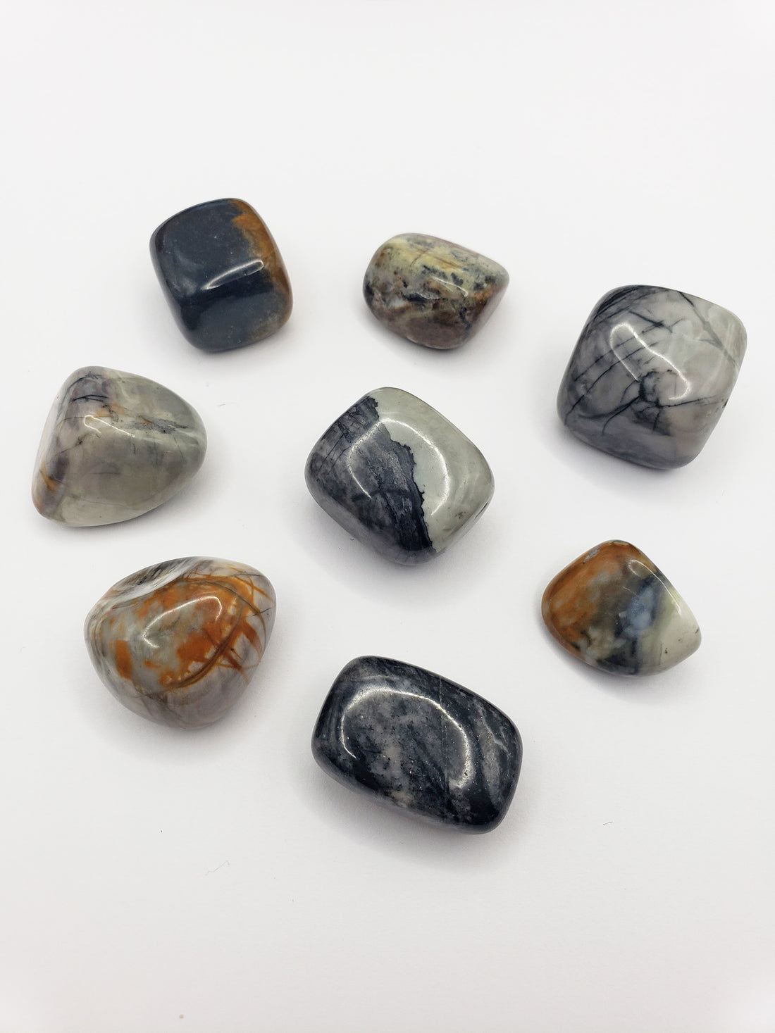 picasso jasper stones on white background