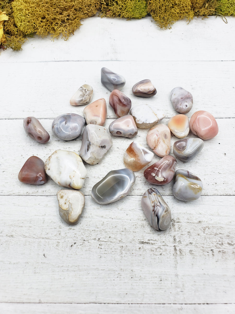 pink botswana agate stones on board