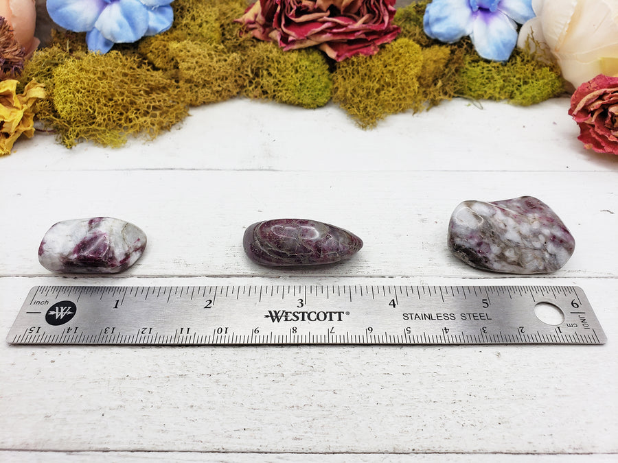 pink tourmaline in quartz crystals by ruler