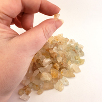 Multi Topaz Raw Crystals Rough Gemstones by the Ounce - Small Stone in Hand
