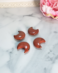 Red Jasper Natural Gemstone Crescent Moon Carving Fidget Stone - Red Jasper Stone Crystal Moons On Tile 2