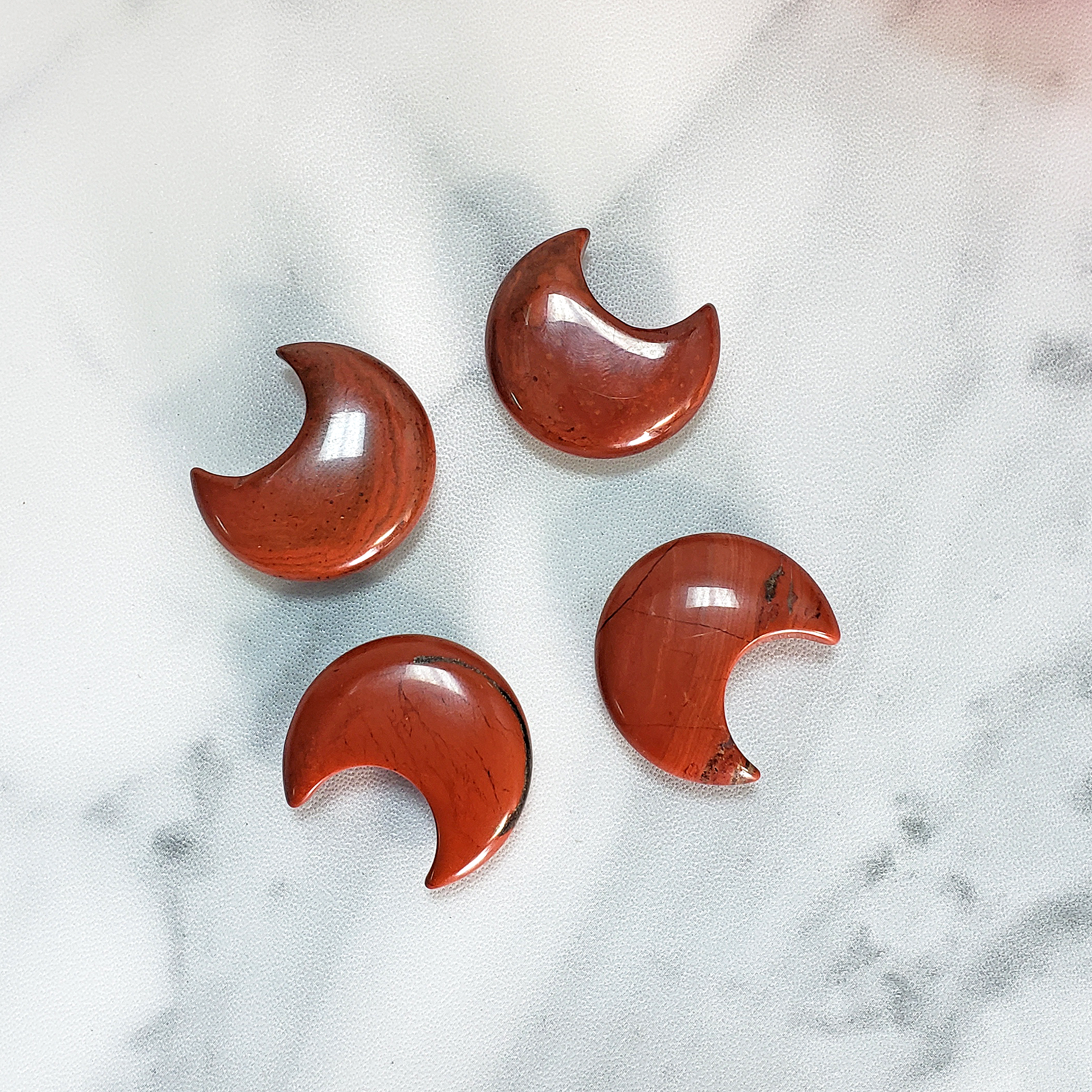 Red Jasper Natural Gemstone Crescent Moon Carving Fidget Stone - Red Jasper Stone Crystal Moons on Tile