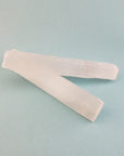 Rough Selenite Crystal Rough Stick - One 3.75 Inch Stick - Blue Background