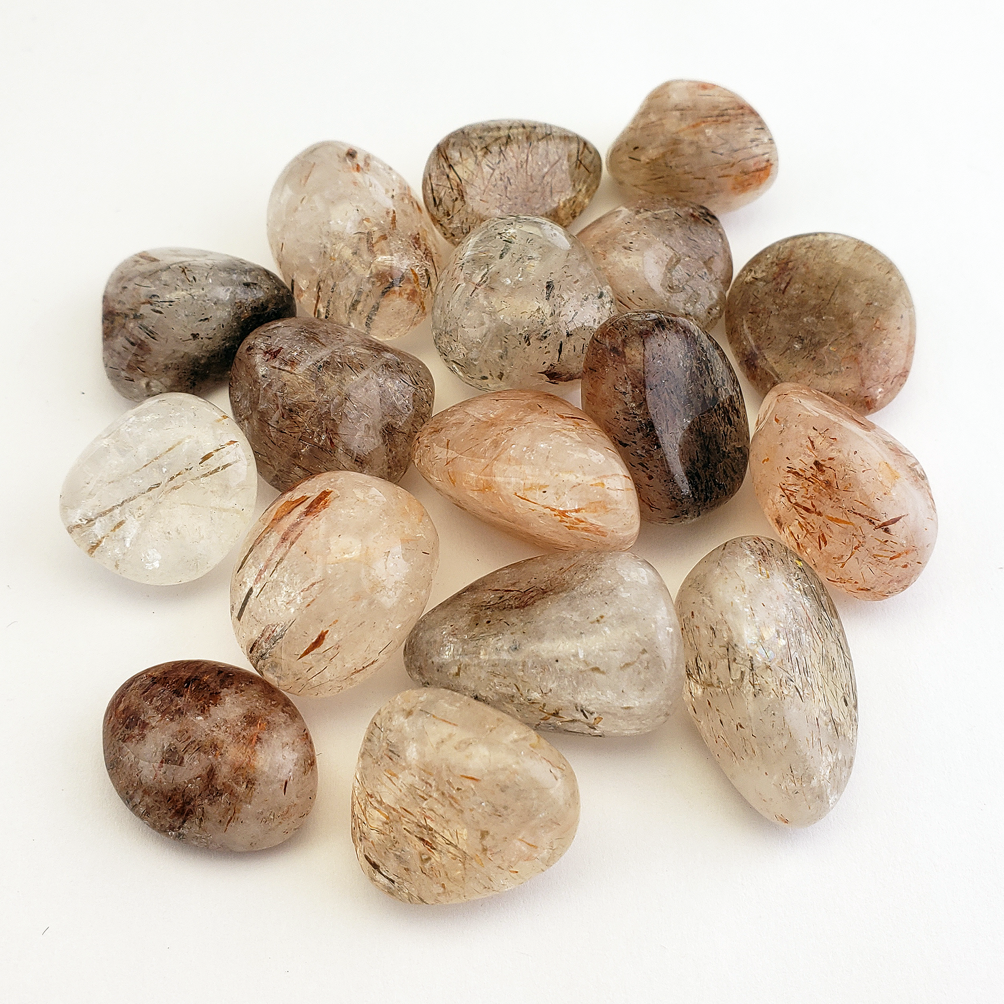 Rutilated Quartz Crystal Natural Gemstone Tumbled Stone - On White Background