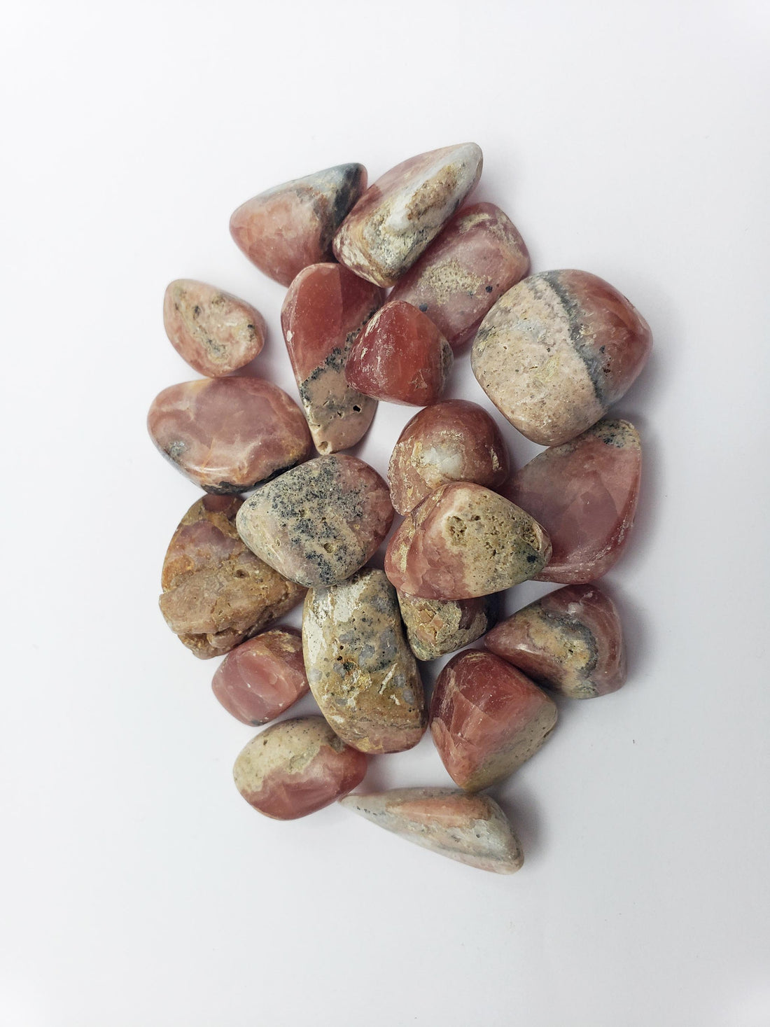 rhodocrosite crystals on white background