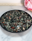 Seftonite Bloodstone Natural Gemstone Chips By the Ounce - Bloodstone Crystal Chips on Black Ceramic Plate