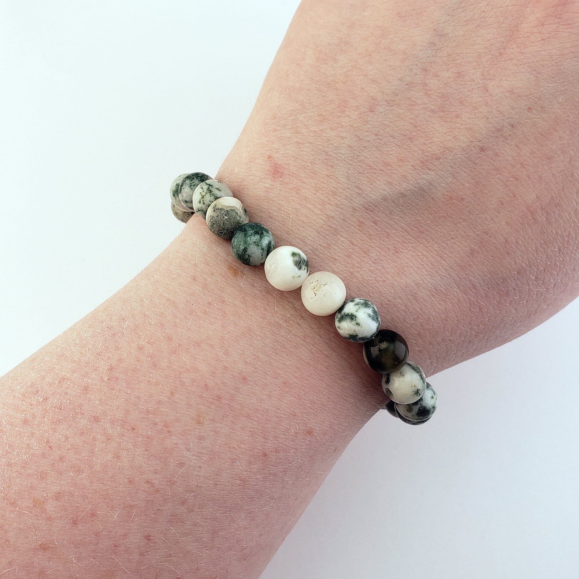 Tree Agate Natural Crystal 7-8mm Bead Bracelet - On Wrist White Background