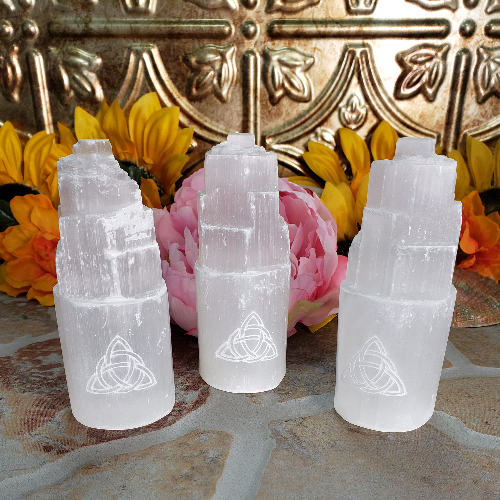 White Selenite Crystal Tower - Engraved with Triquetra - Group Photo for Comparison