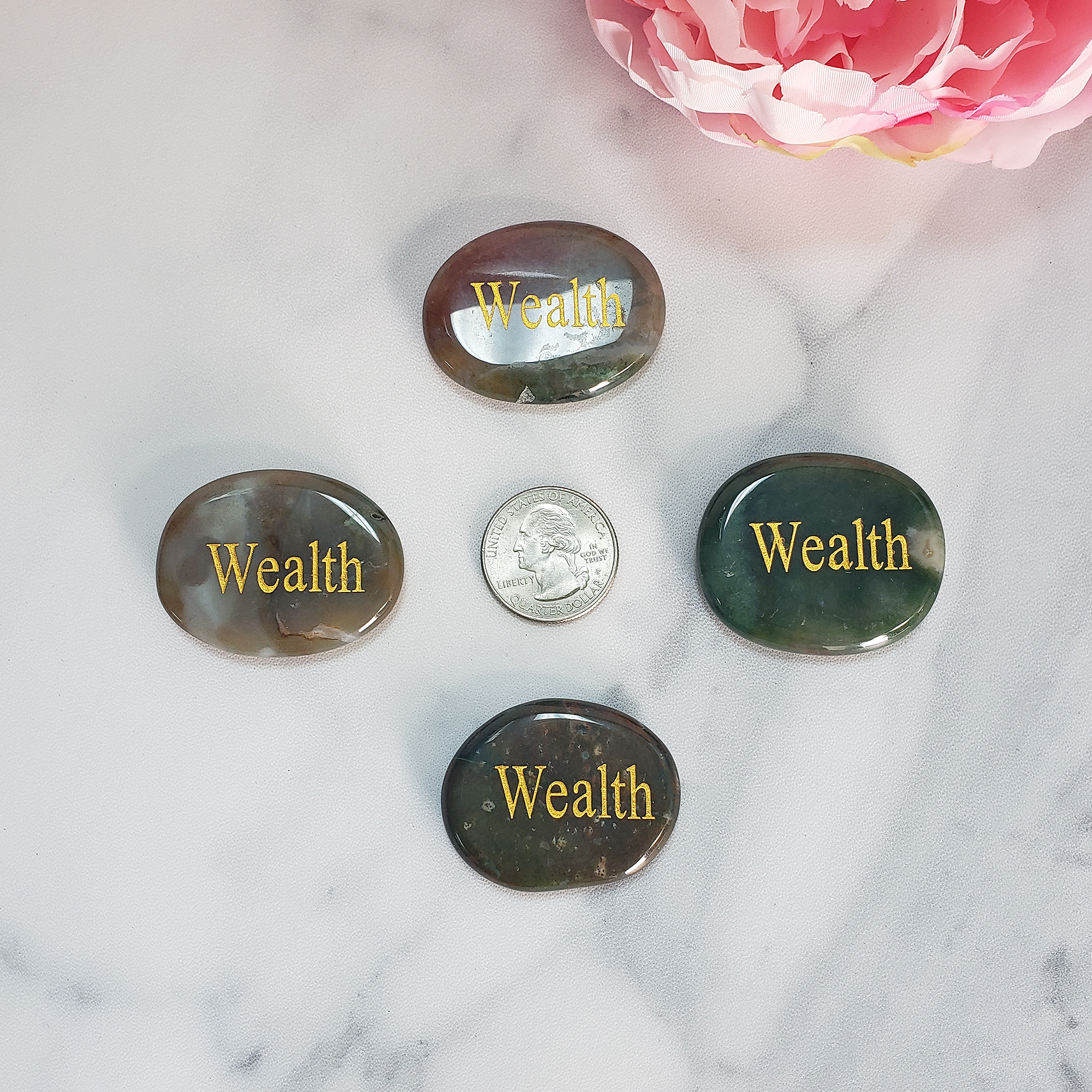 Wealth Affirmation Palm Stone | Crystal Worry Stone with &quot;Wealth&quot; Engraving - Size Comparison