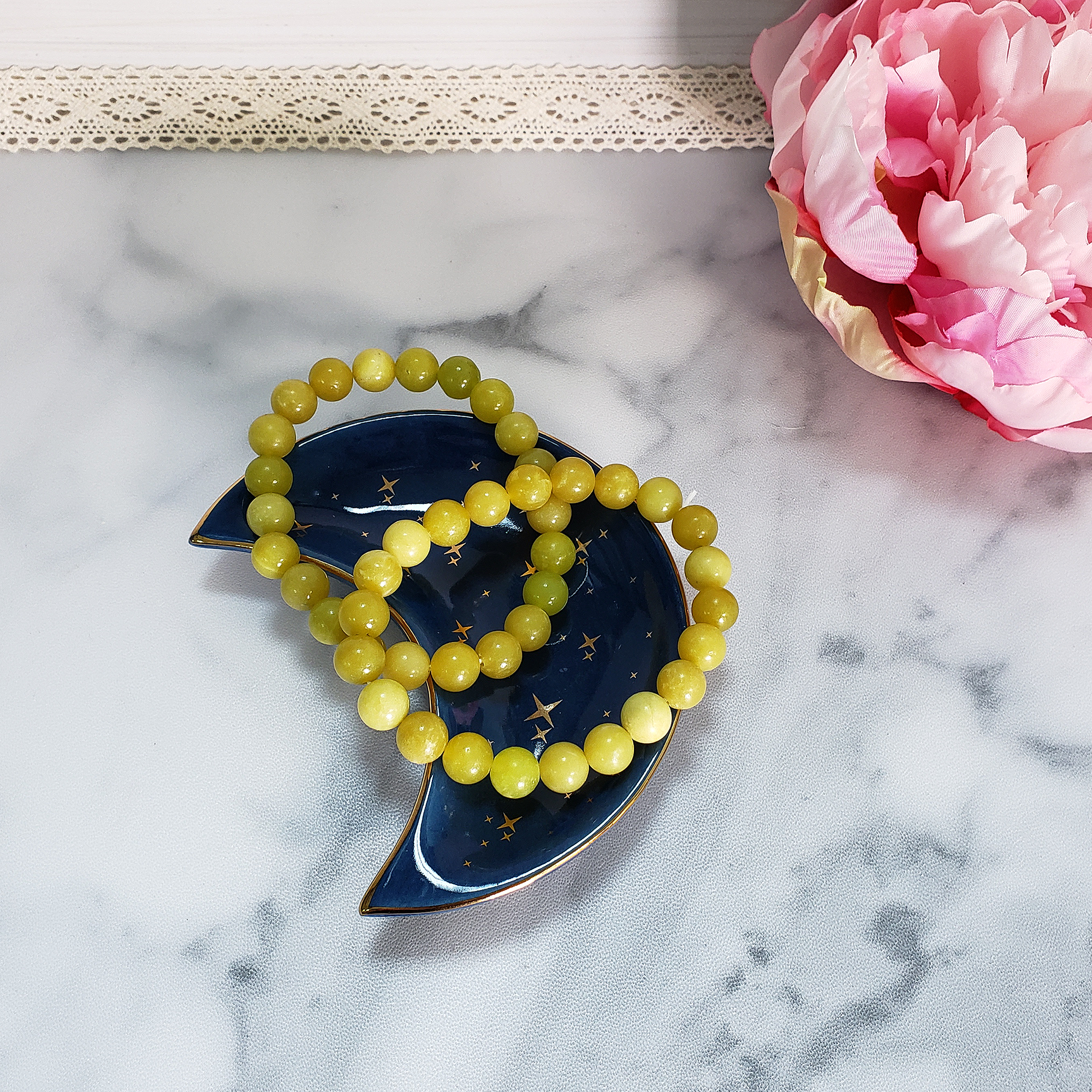 Yellow Serpentine Natural Crystal 7-8mm Bead Bracelet - Two Serpentine Stone Stretch Bracelets on Jewelry Dish