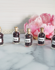 Garnet Stone Natural Crystal Chips in Glass Bottle