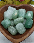 green included quartz crystal stones in bowl