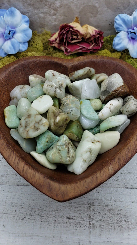 video of chrysoprase stones in heart-shaped bowl