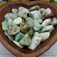 video of chrysoprase stones in heart-shaped bowl