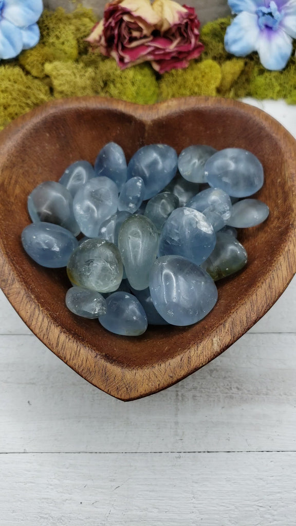 celestite stones in heart-shaped bowl