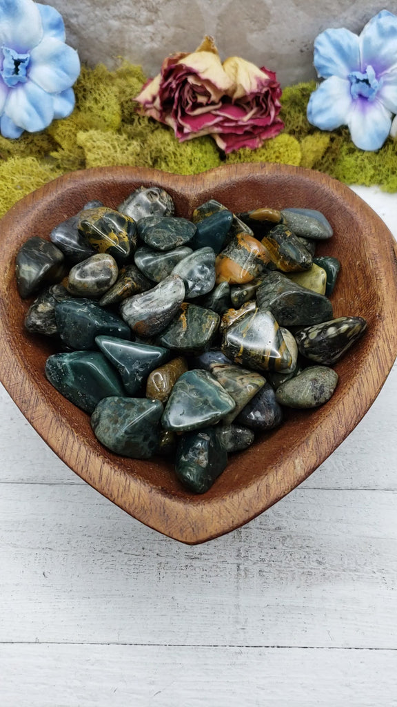 ocean jasper stones in heart-shaped bowl