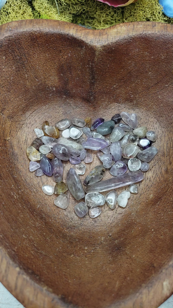 cacoxenite crystal chips in heart-shaped bowl