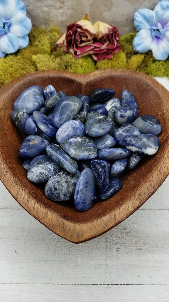 video of tumbled sodalite in wooden heart bowl