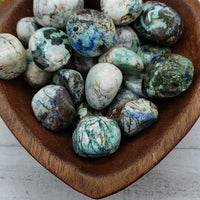 azurite malachite stones in heart-shaped bowl