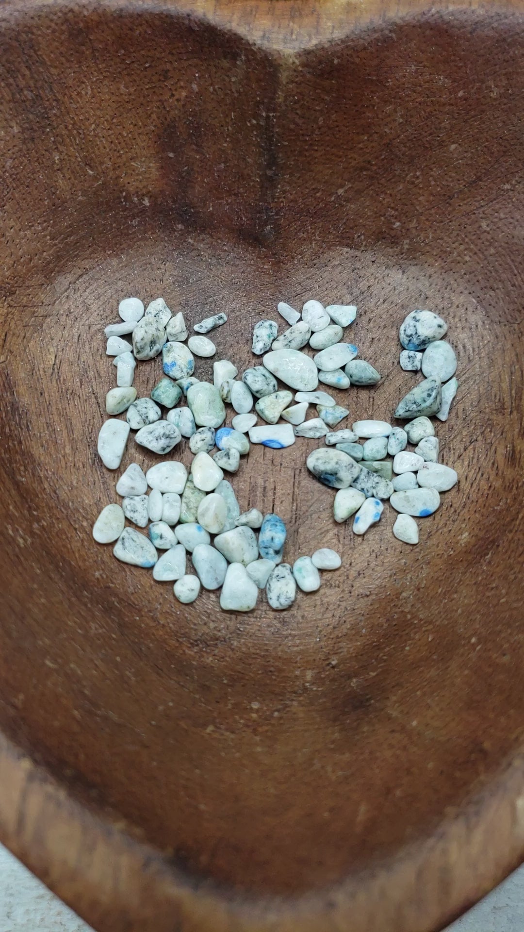 k2 jasper crystal chips being poured into bowl