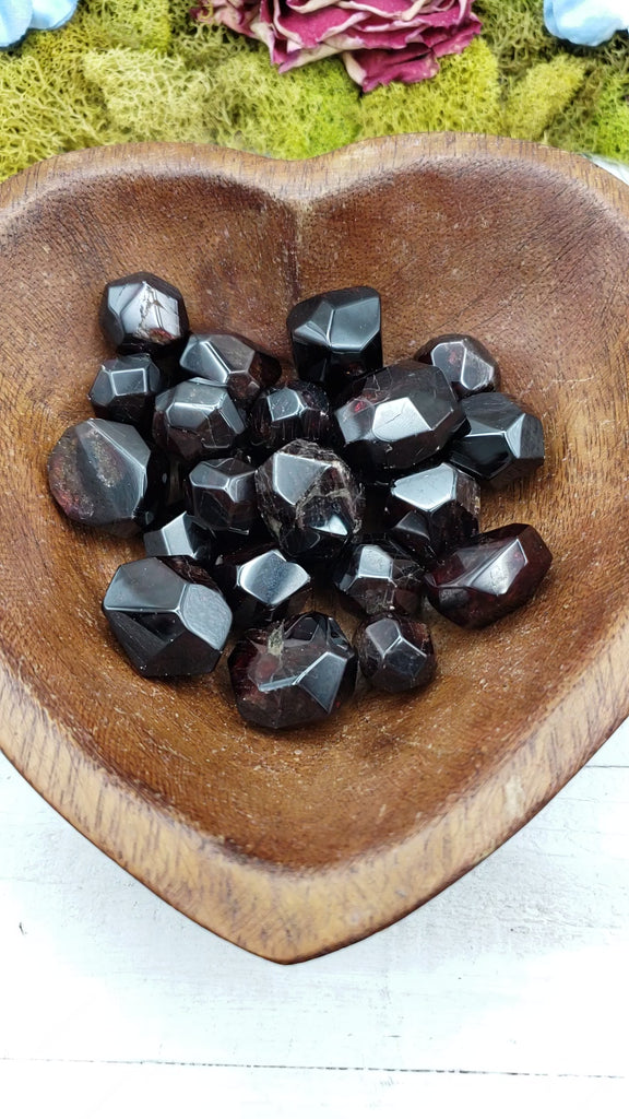 video of garnet stone pieces in bowl 