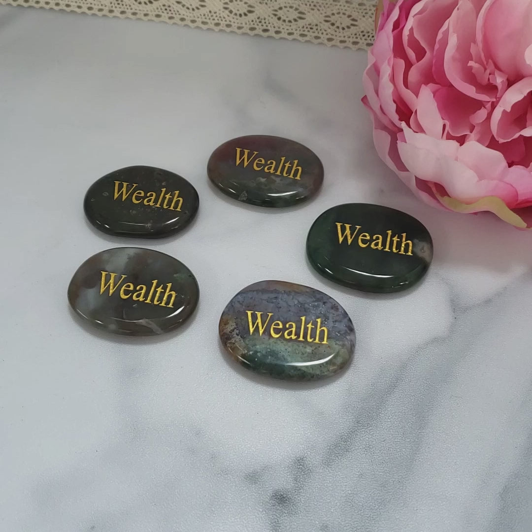 Wealth Affirmation Palm Stone | Crystal Worry Stone with "Wealth" Engraving - Video