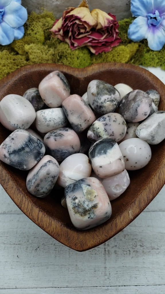 video of Pink Opal stones in heart-shaped bowl